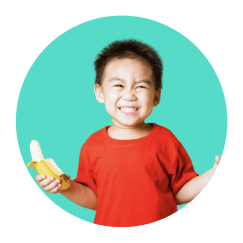 kid holding banana