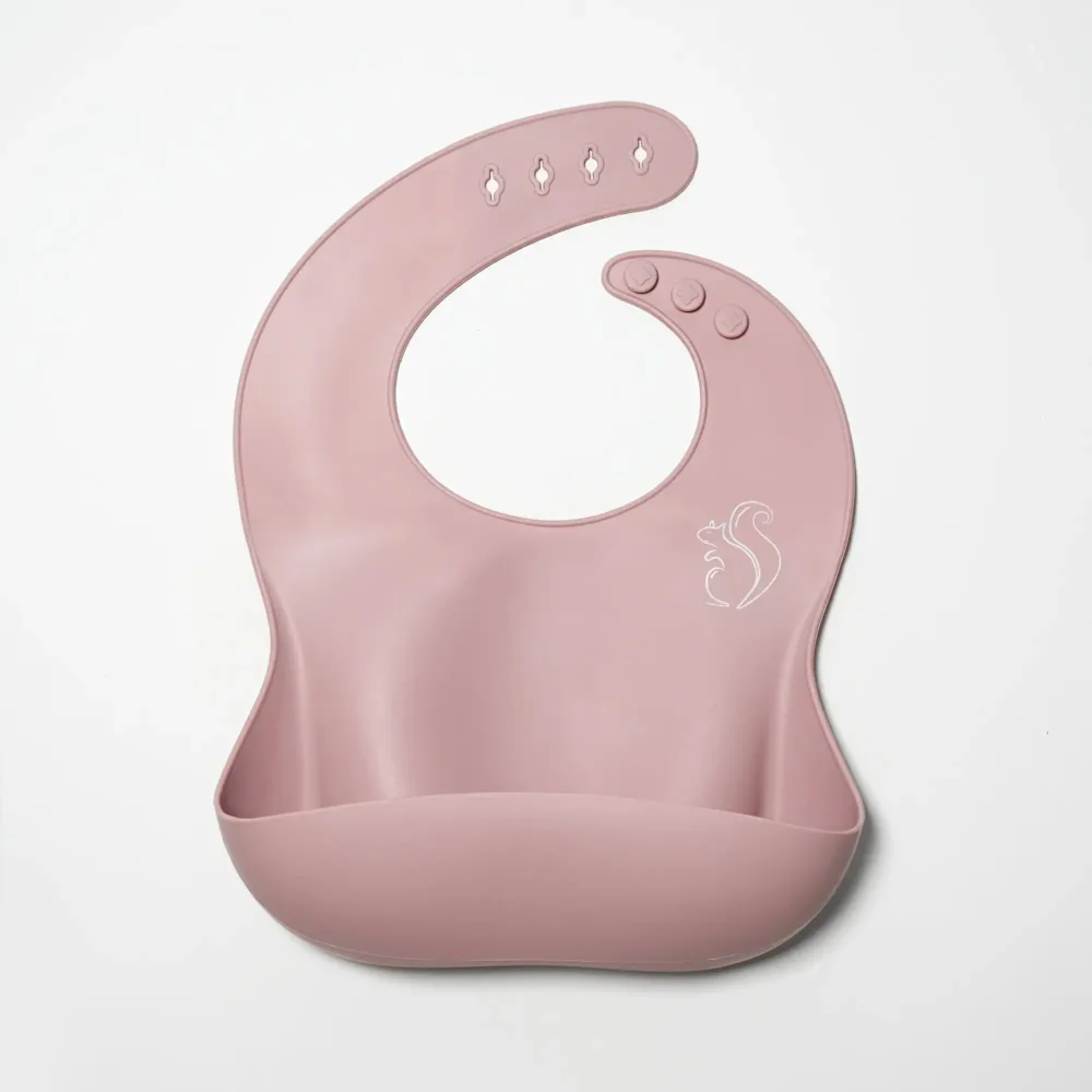 Dusty Pink Silicone Bib with catcher for baby.